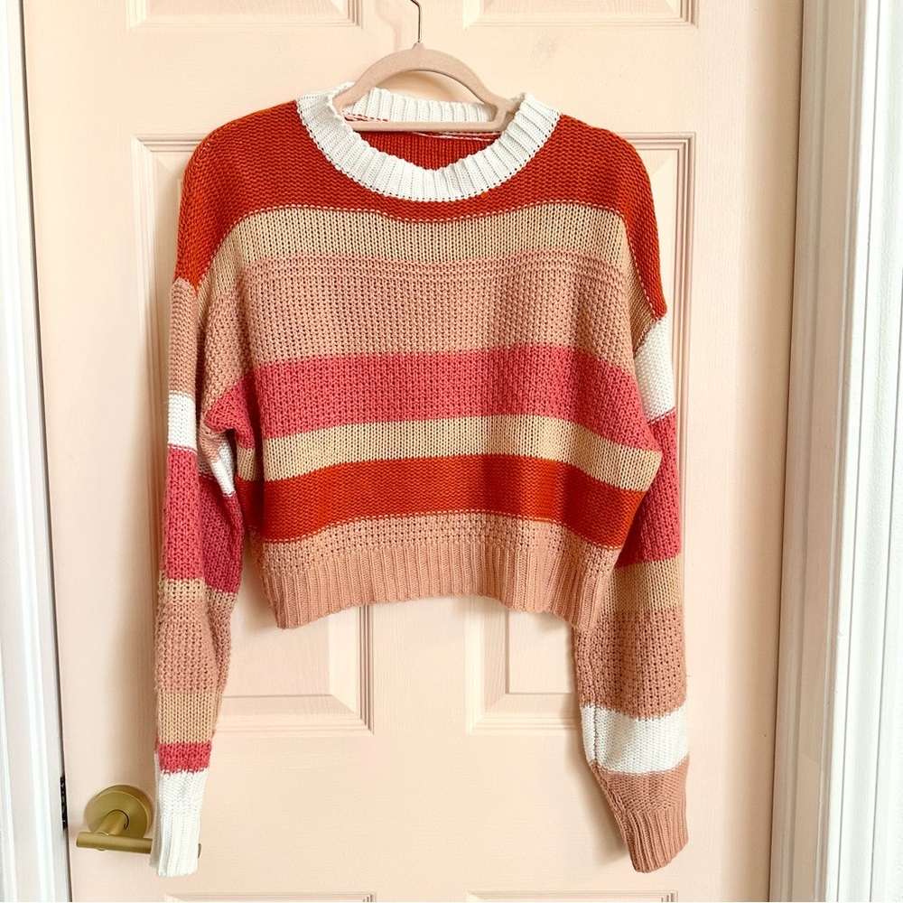 Orange and pink striped knit pullover